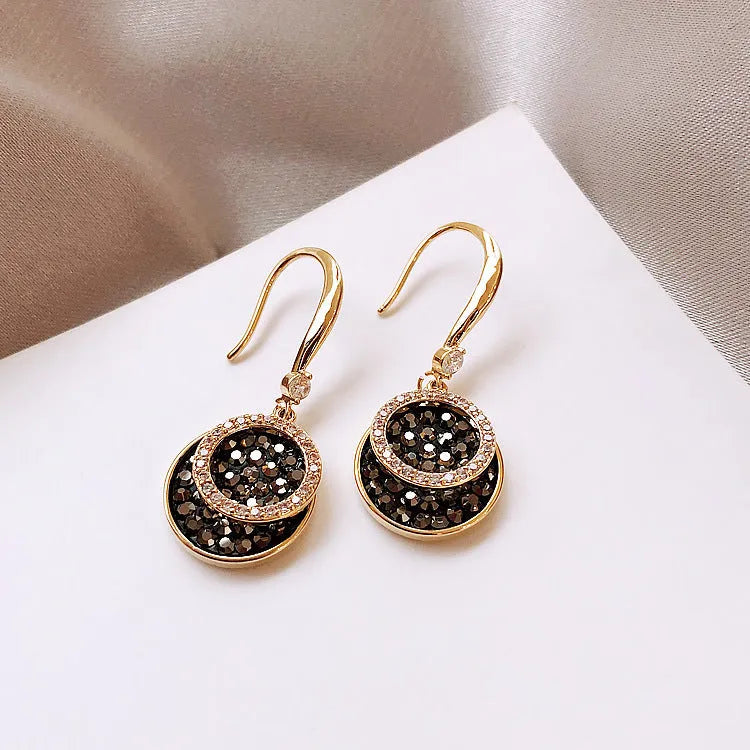Black geometric alloy earrings with round pieces and 3.6cm length, retro Hong Kong style design.