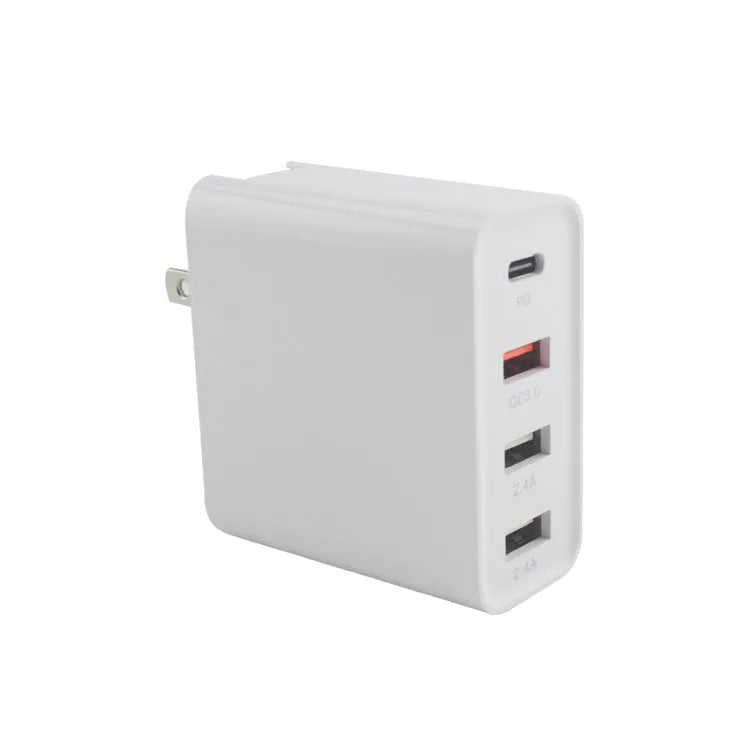 Black and white four-port USB-C wall charger with UK, US, EU, and AU plug options.