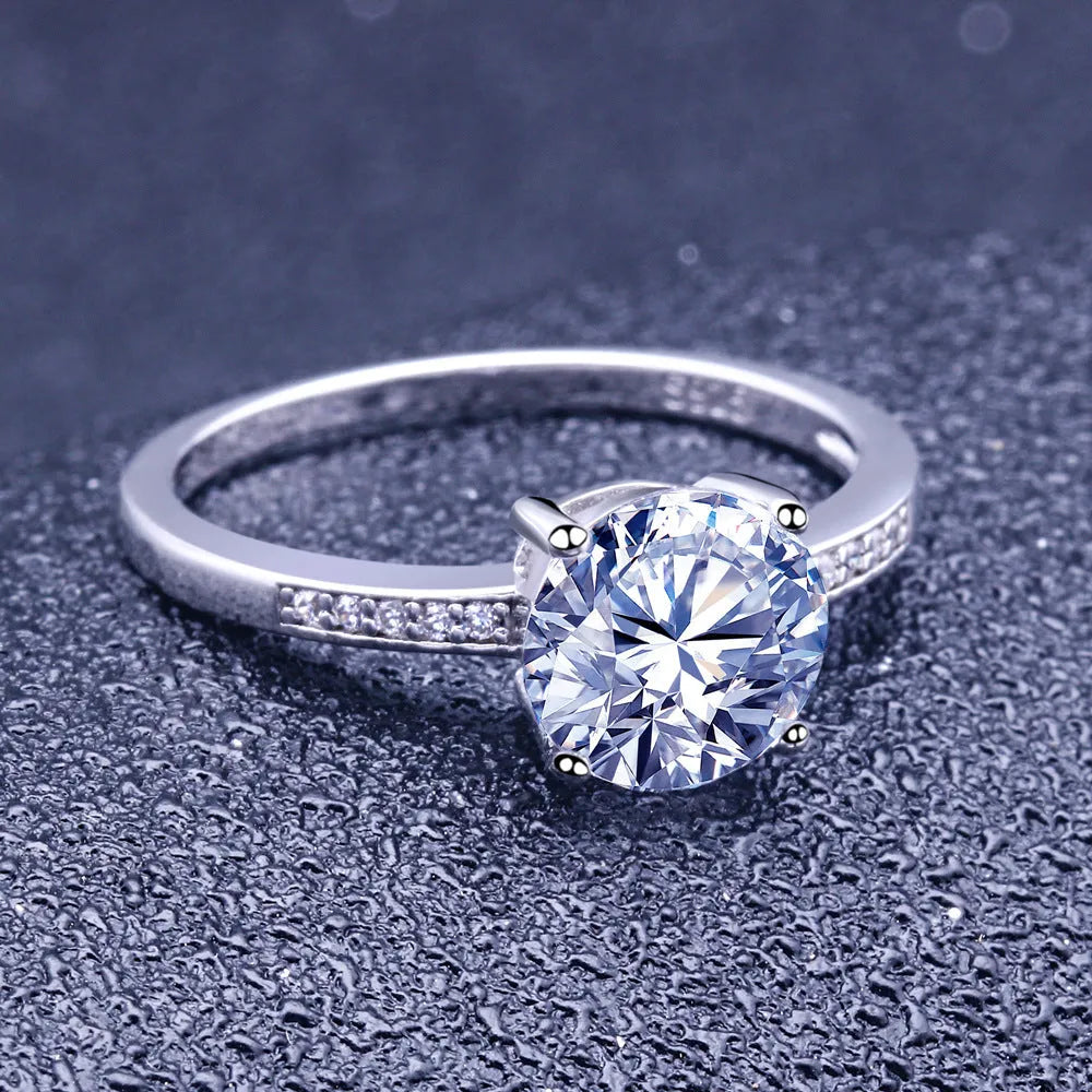 925 sterling silver engagement ring with 7.5mm clear stone on white background