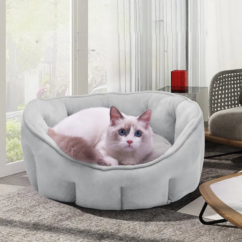 Grey plush cat kennel with an integrated hammock, showing soft interior and dimensions of 46cm wide.