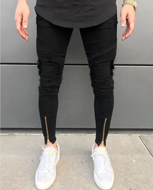 Ripped zipper jeans in black for women with stretch denim and multiple metal zippers on the legs