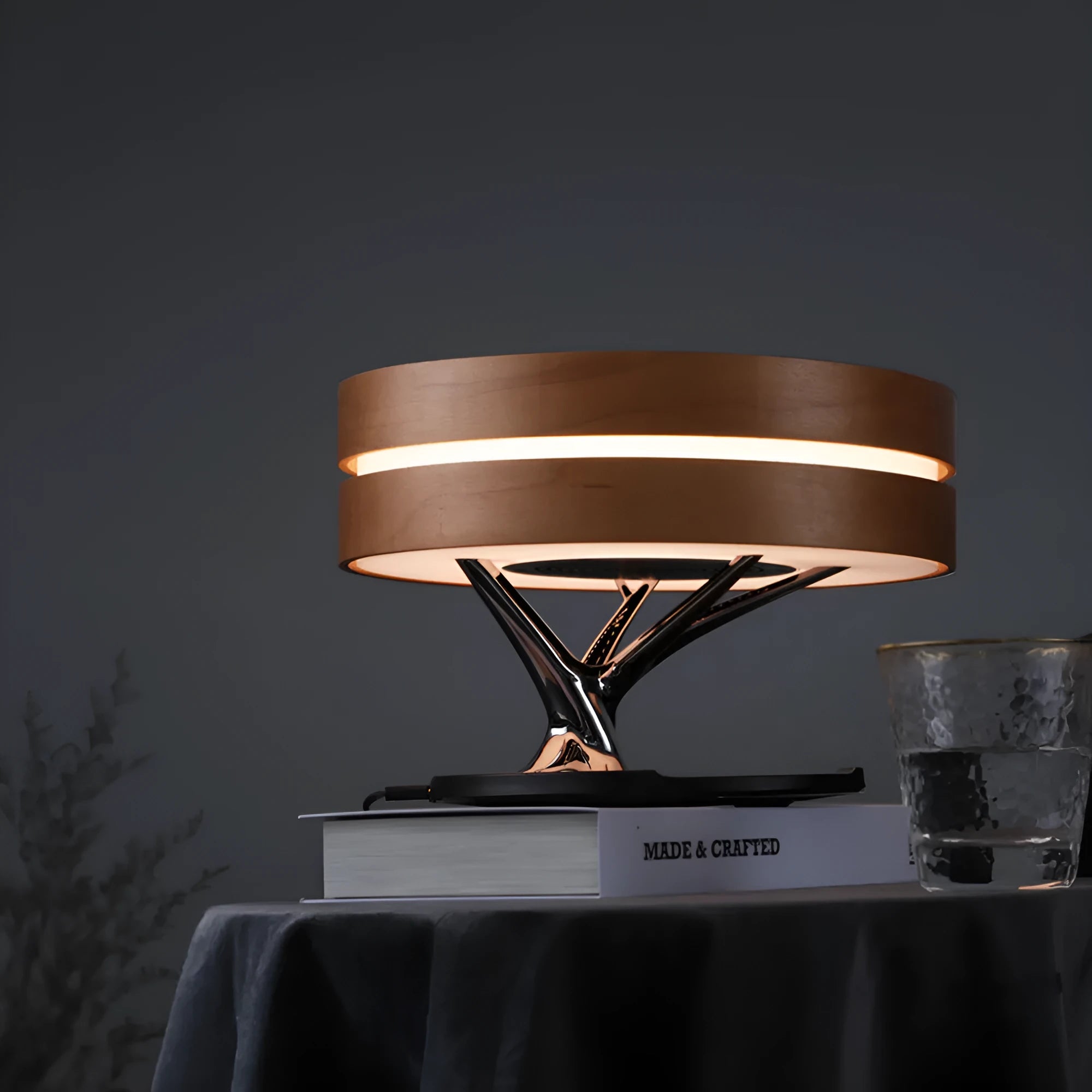 Round maple coloured ABS PC Bluetooth speaker LED lamp with wireless charging pad for living room