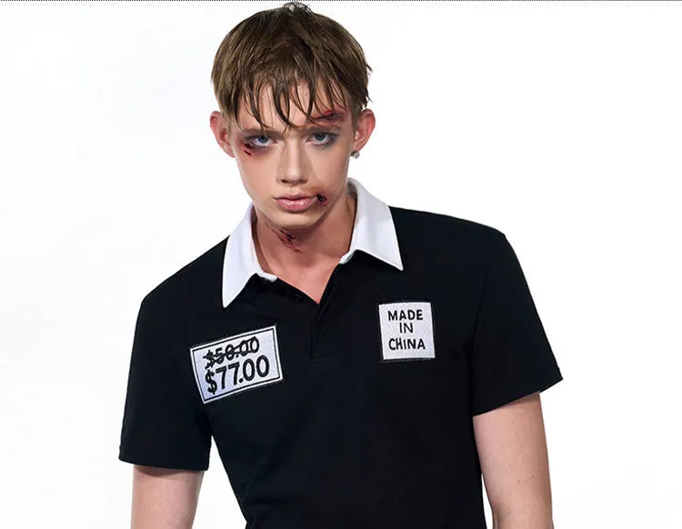 Black slim fit men's polo shirt with embroidery design and short sleeves