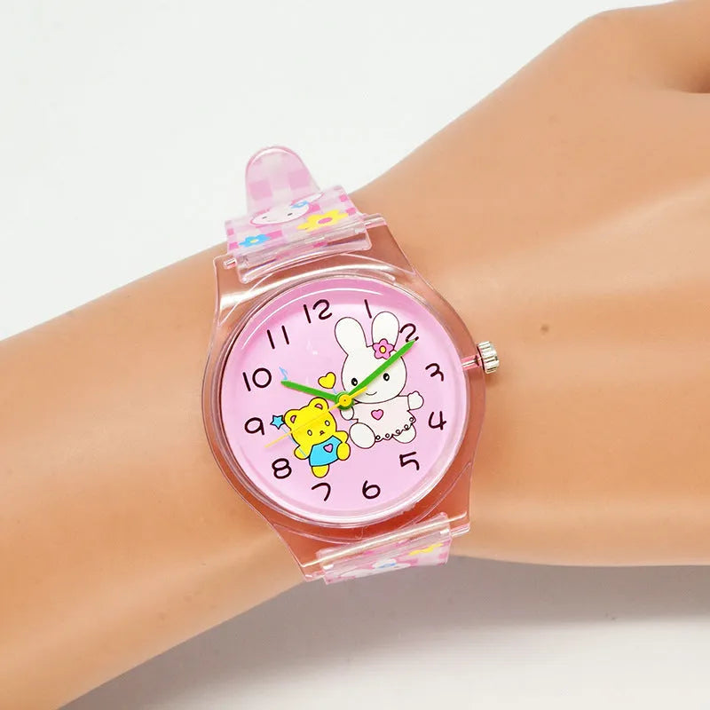 Cute girl quartz watch with animal print dial and pink PVC band on white background