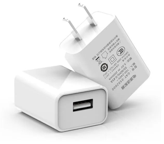 5V1A charging head power adapter with UK plug, USB cable, and power line set on a white background.