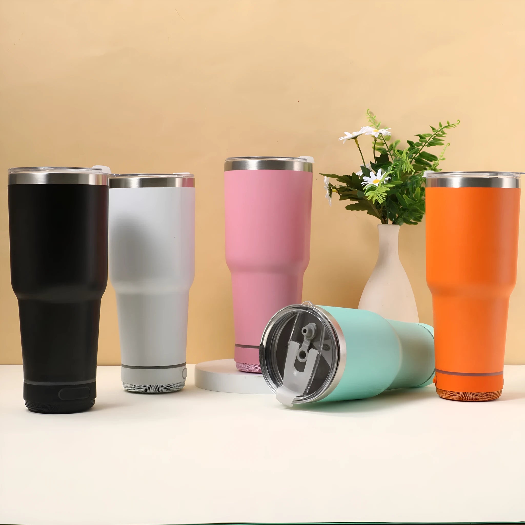 30oz Bluetooth Audio Cup in pink with 304 stainless steel insulation, showing speaker and drink opening