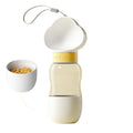 Portable dog water bottle with rotary switch and food container in purple, for outdoor use