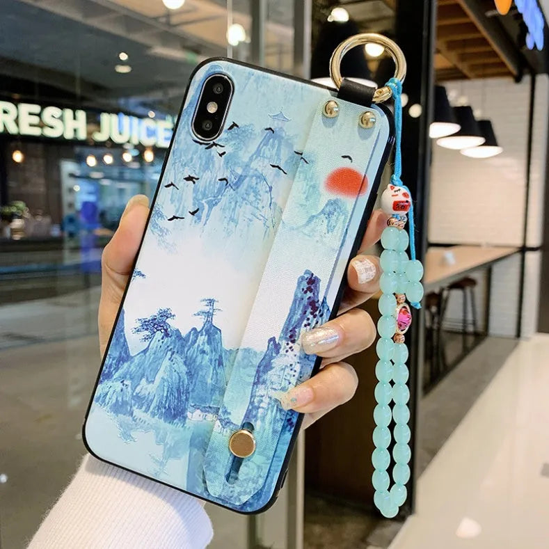 Compatible iPhone case with a detachable rose flower wrist strap, shown in one of ten available styles.