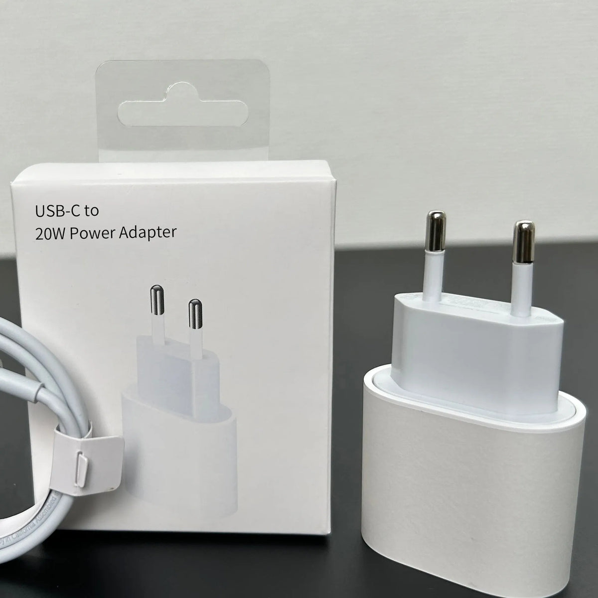 White 20W PD charger with Type-C interface showing international socket compatibility
