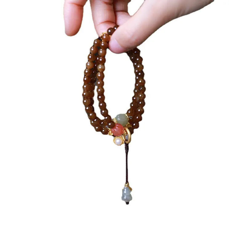 Brown jade Hetian three-ring bracelet with geometric design and silver-plated accessories