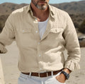 Men's long-sleeved casual button-up shirt in a cotton linen blend, shown in a loose fit.