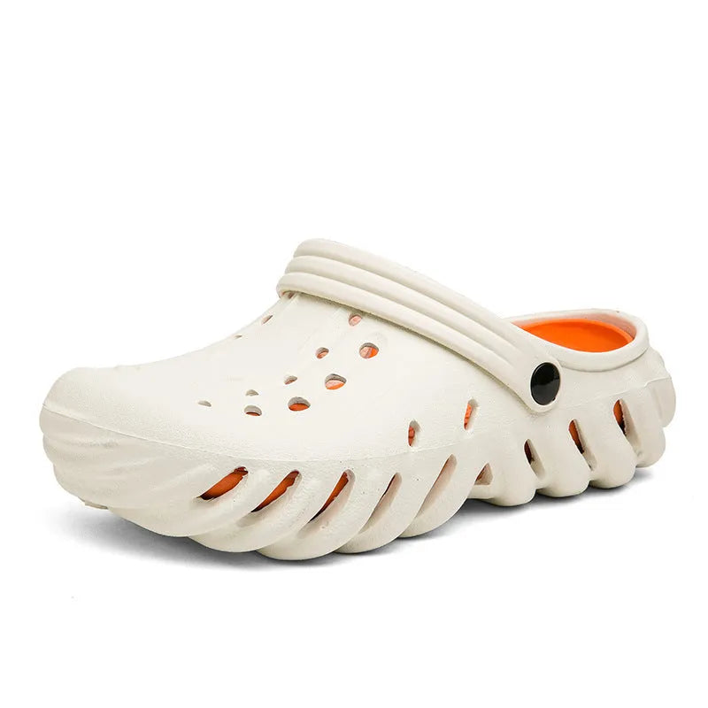 Men's beige EVA slipper sandals with hollow out design and round toe on a plain background.