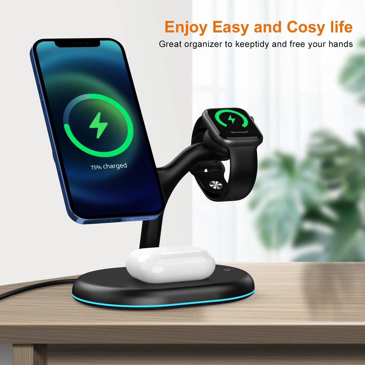 Black three-in-one magnetic wireless charger for mobile phones, tablets, and earbuds on a desk.