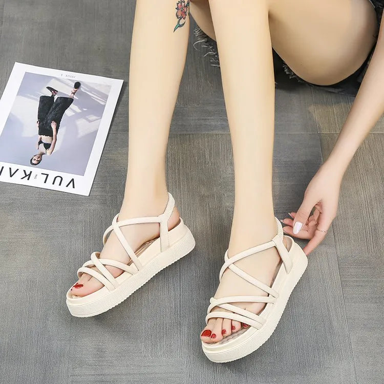 Women's black Roman platform sandals with round toe and slip-on sleeve design