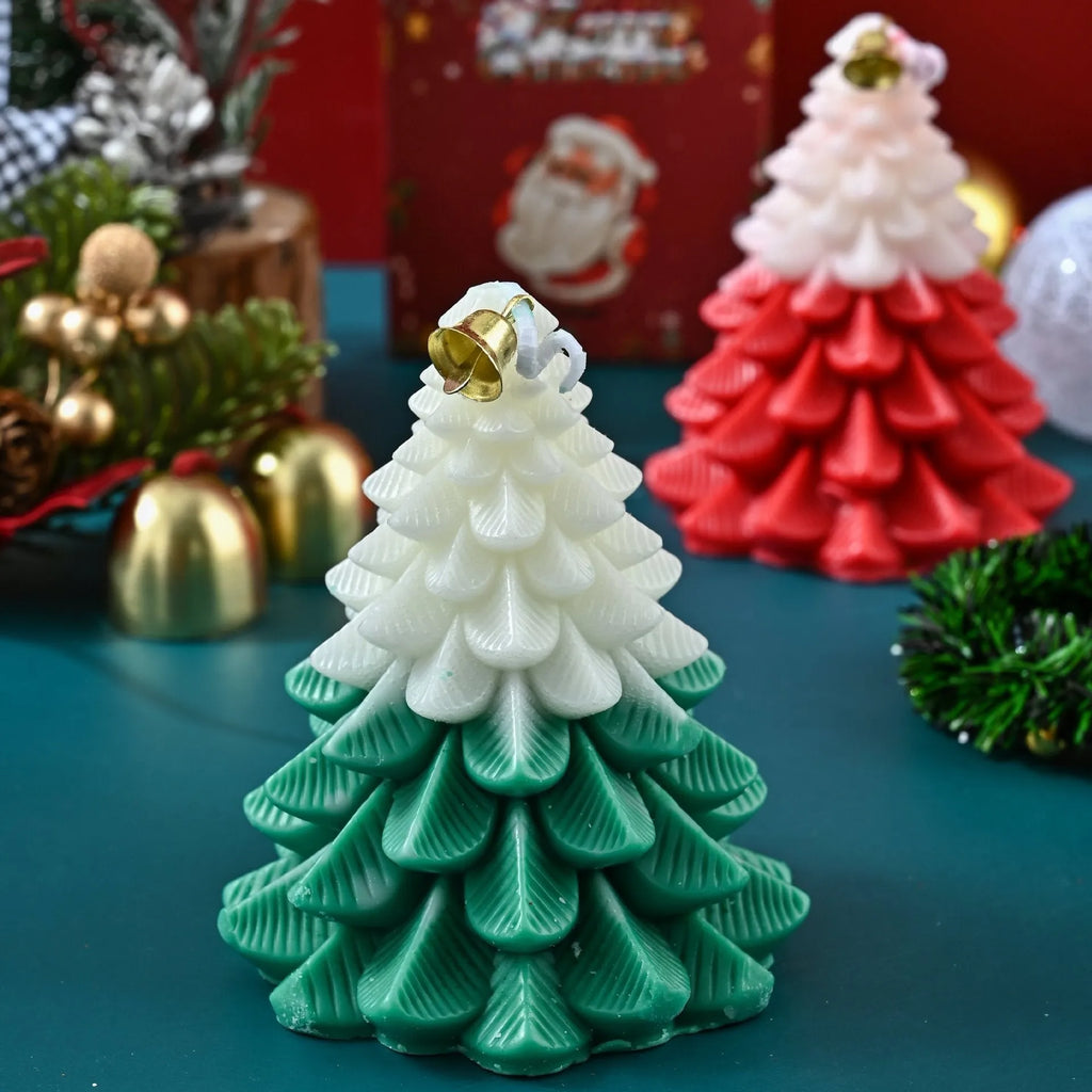 Christmas tree shaped soy wax aromatherapy candle in green on a table with festive home decoration
