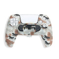 Camouflage pattern silicone protective case fitted on a black PS5 DualSense controller.