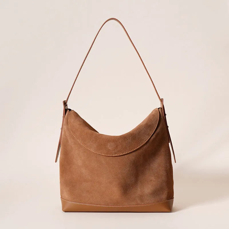 Light brown genuine leather retro style women's shoulder bag with clamshell opening.