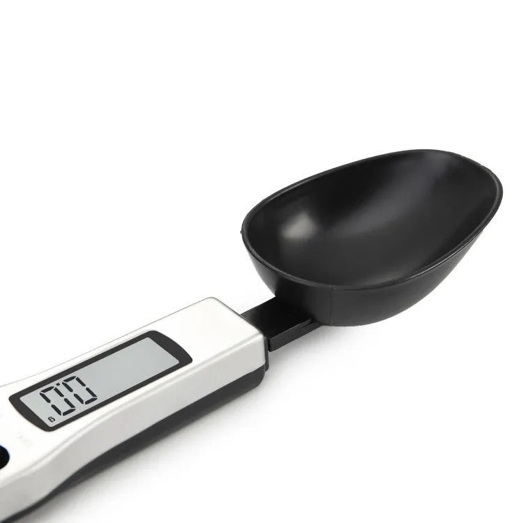 Smart digital measuring spoon kitchen scale with LCD display showing weight measurement