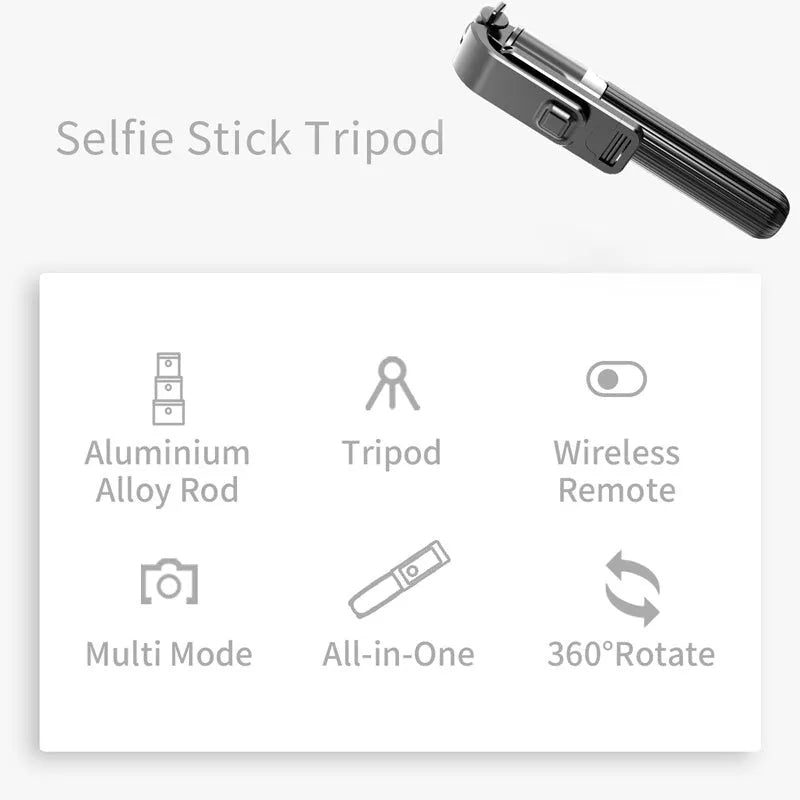 Black aluminium phone tripod selfie stick fully extended to 700mm next to an iPhone.