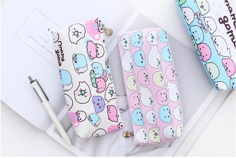 Blue triangular PU leather stationery bag with cartoon face and large zipper.