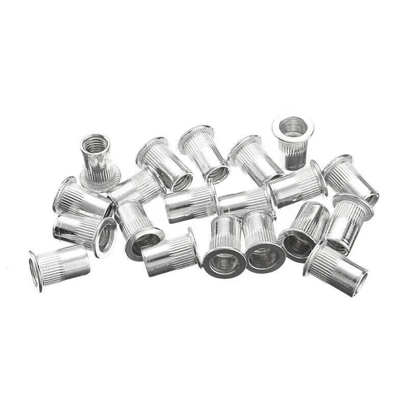 Alloy steel manual riveter nut gun tool kit with a set of interchangeable mandrels on a workbench.