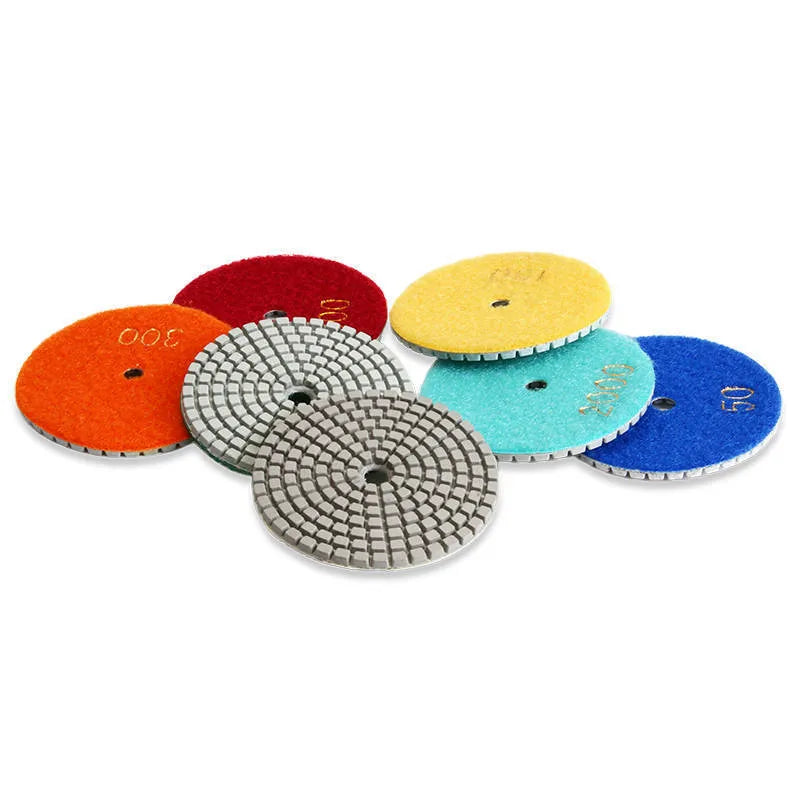 10 emery stone polishing pads in assorted grits with 80mm diameter and 10mm centre holes