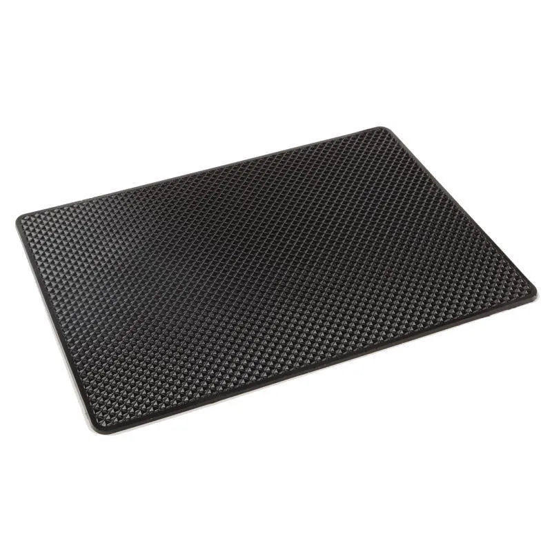 Small mesh non-slip car mat 18x13cm in grid colour on dashboard