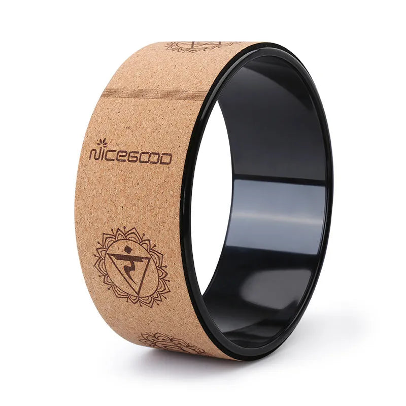 Cork yoga wheel 32cm diameter with natural cork surface and rubber edge, classic black colour