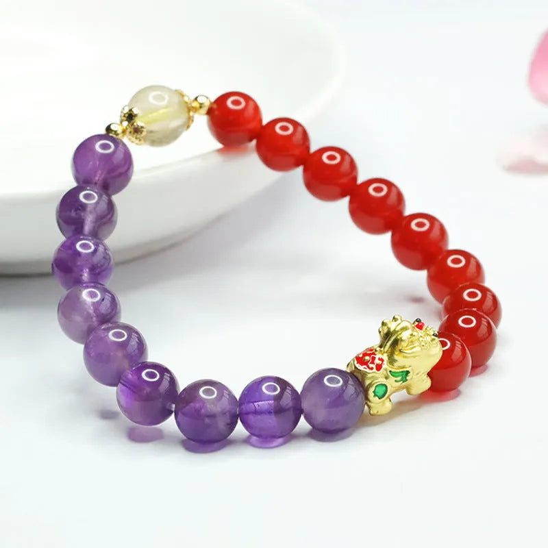 Close-up of an amethyst and red agate beaded bracelet in Chinese style with 8mm stone beads.