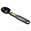 Digital kitchen spoon scale with LCD display showing weight measurement