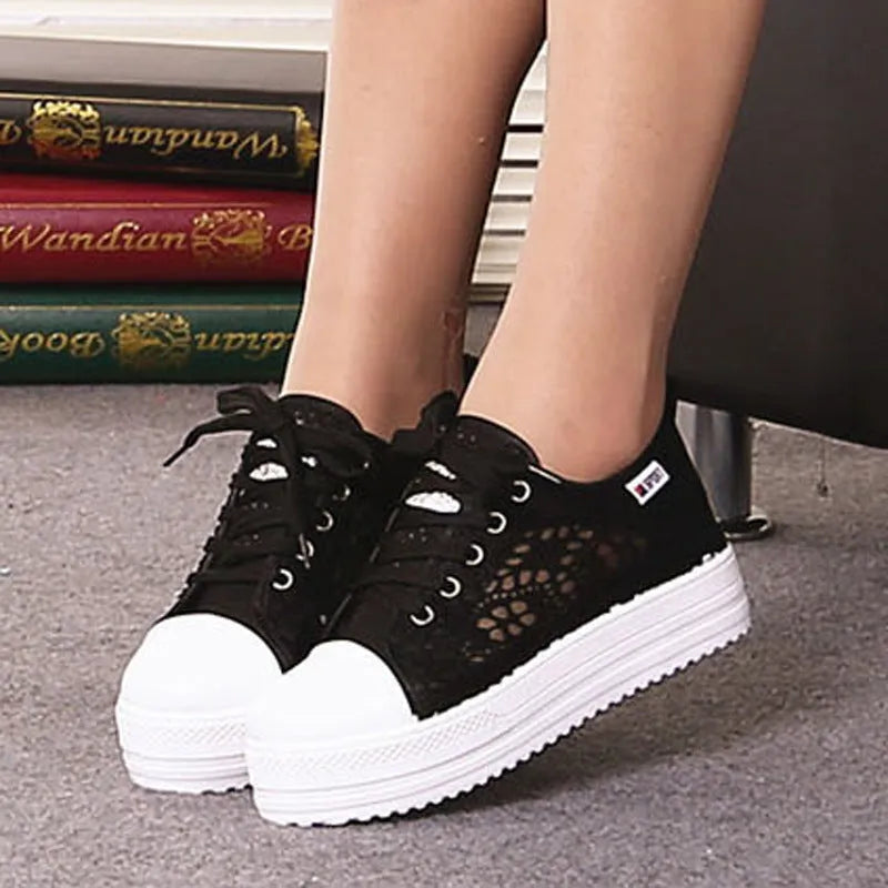 White canvas shoes for women with rubber sole and plain pattern, sizes 35 to 43