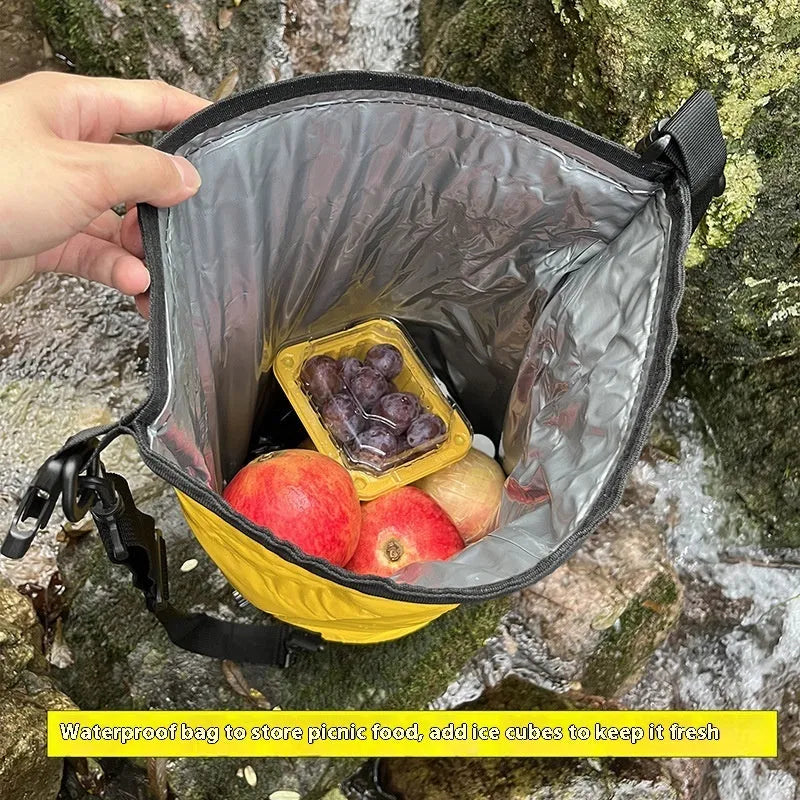 Yellow and black PVC dry bag with 20L capacity showing wet/dry separation compartments for water sports