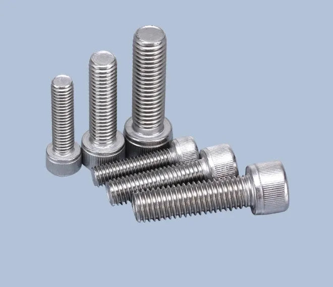 Stainless steel phono cartridge mounting kit with various bolts, nuts, washers and two allen keys