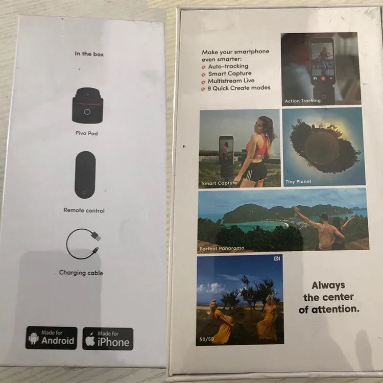 Matte black PIVO face tracking camera mounted on a surface with a smartphone attached.
