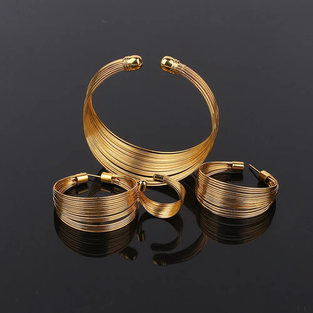 Women's jewellery set with alloy multi-layer bracelet, ring, and earrings in exotic style electroplated finish