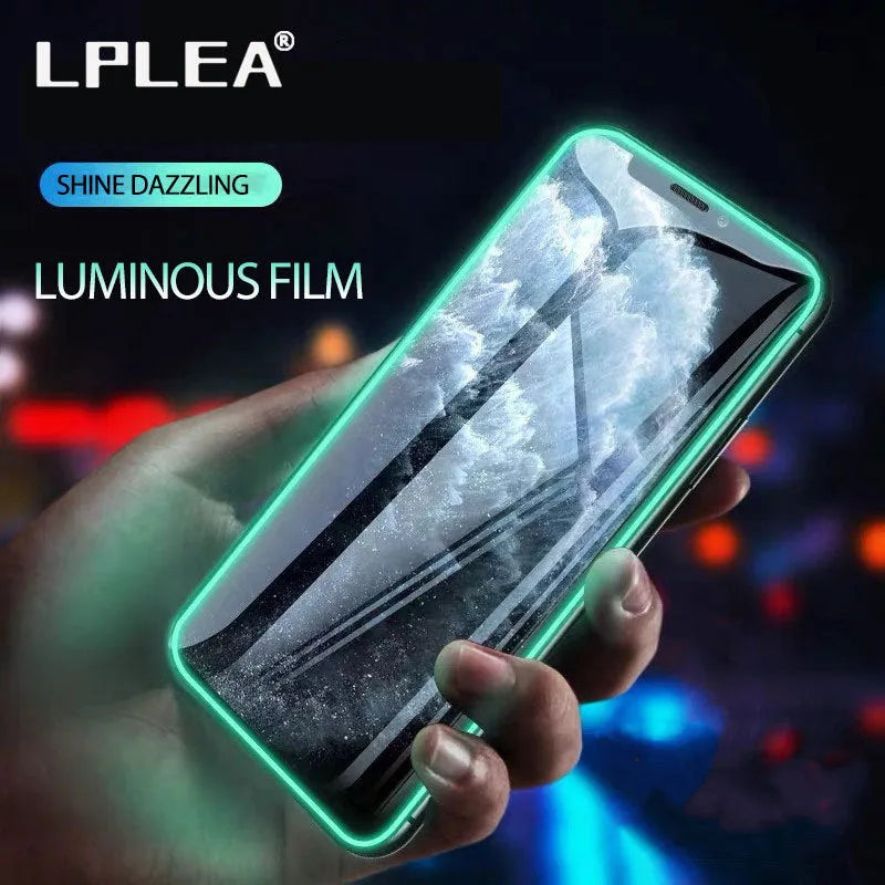 Luminous full cover tempered glass screen protector for iPhone glowing in dark on a phone.