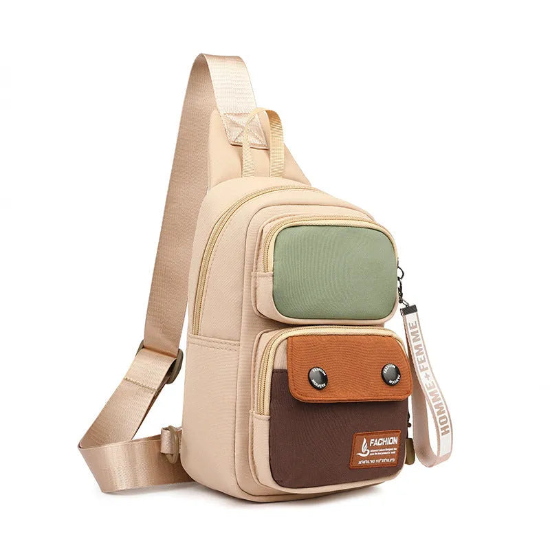 Outdoor crossbody shoulder bag in nylon with contrast colour options and multiple storage compartments
