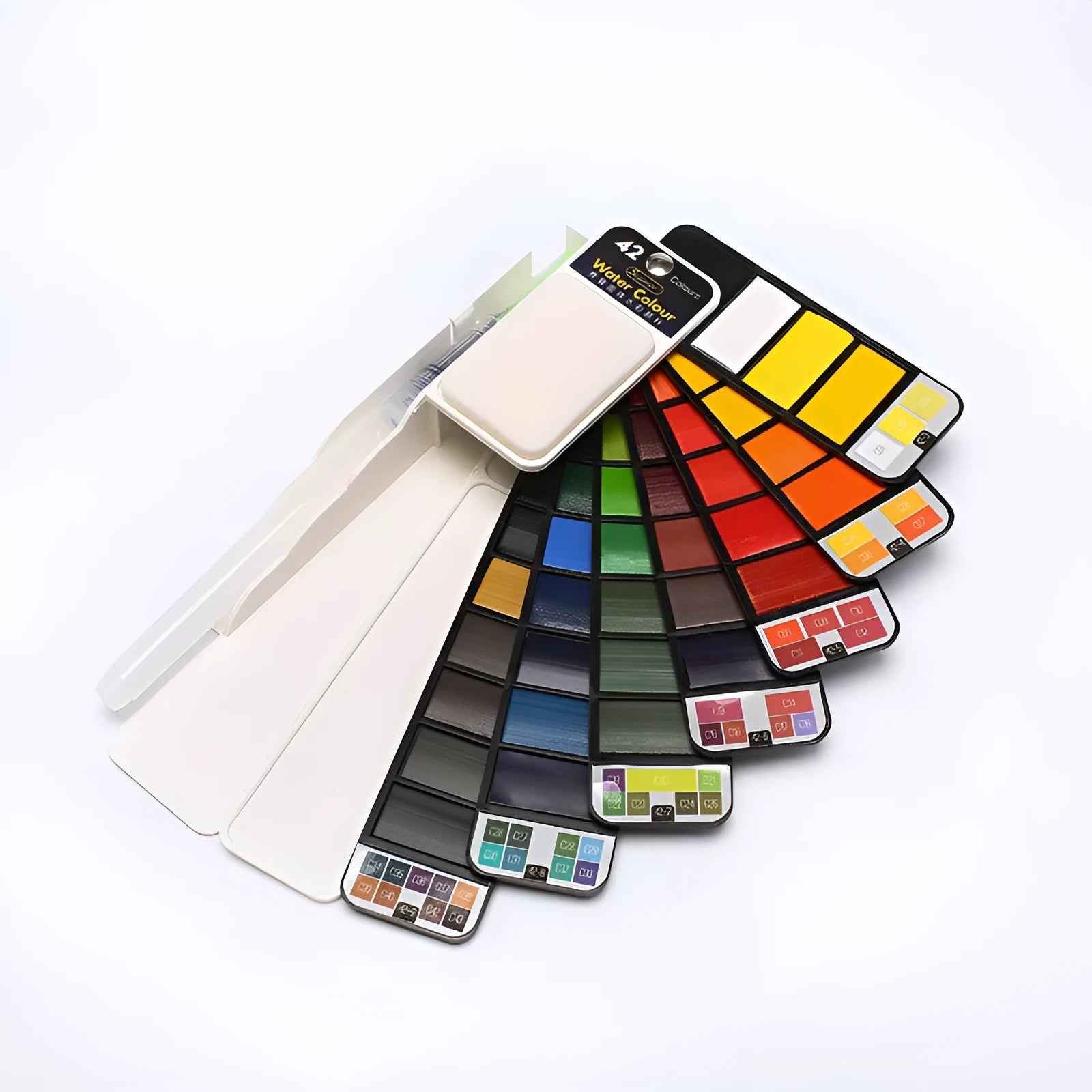Open fan-shaped foldable solid watercolour paint set showing colours, fountain pen, palette, and sponge in transparent box.