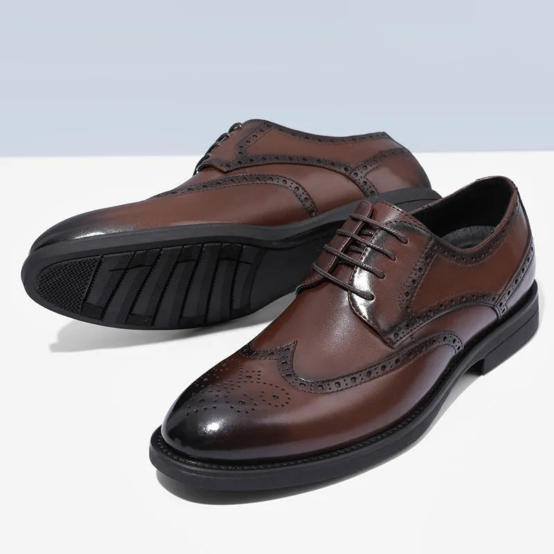 Men's black brogue leather shoes with wingtip perforations and lace-up closure on neutral background