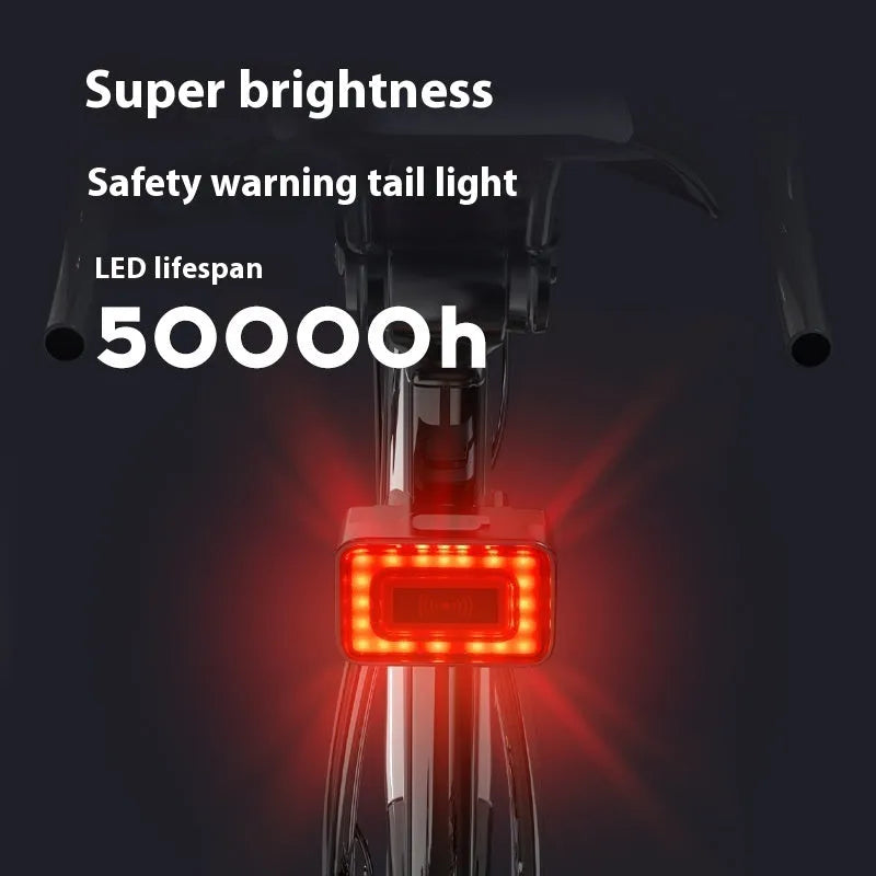 Smart millimetre wave radar bicycle taillight with mounting bracket on a black background.