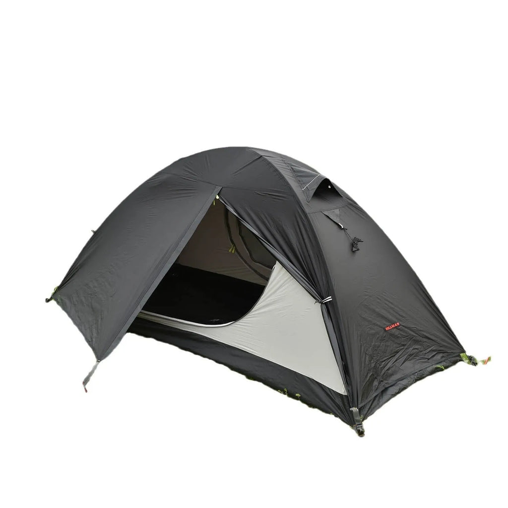 Black single person double account tent with aluminium poles pitched outdoors.
