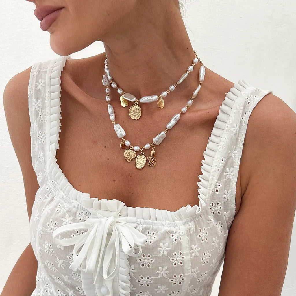 French pearl light luxury clavicle ocean necklace geometric shell shape gold finish on woman