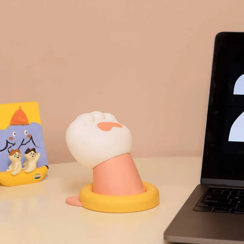 White cat paw shaped desk lamp with touch controls and three brightness settings