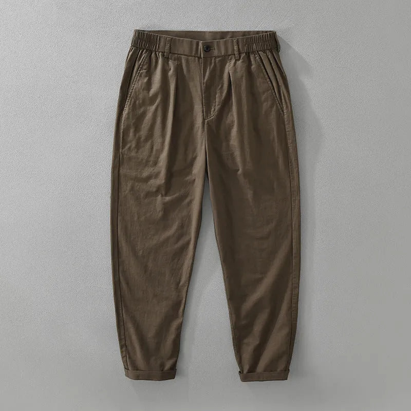 Men's loose straight-leg casual trousers in a cotton linen blend fabric, shown in black colour.