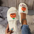 Women's white and yellow pumpkin cartoon plush open toe slippers on anti-slip PVC sole.