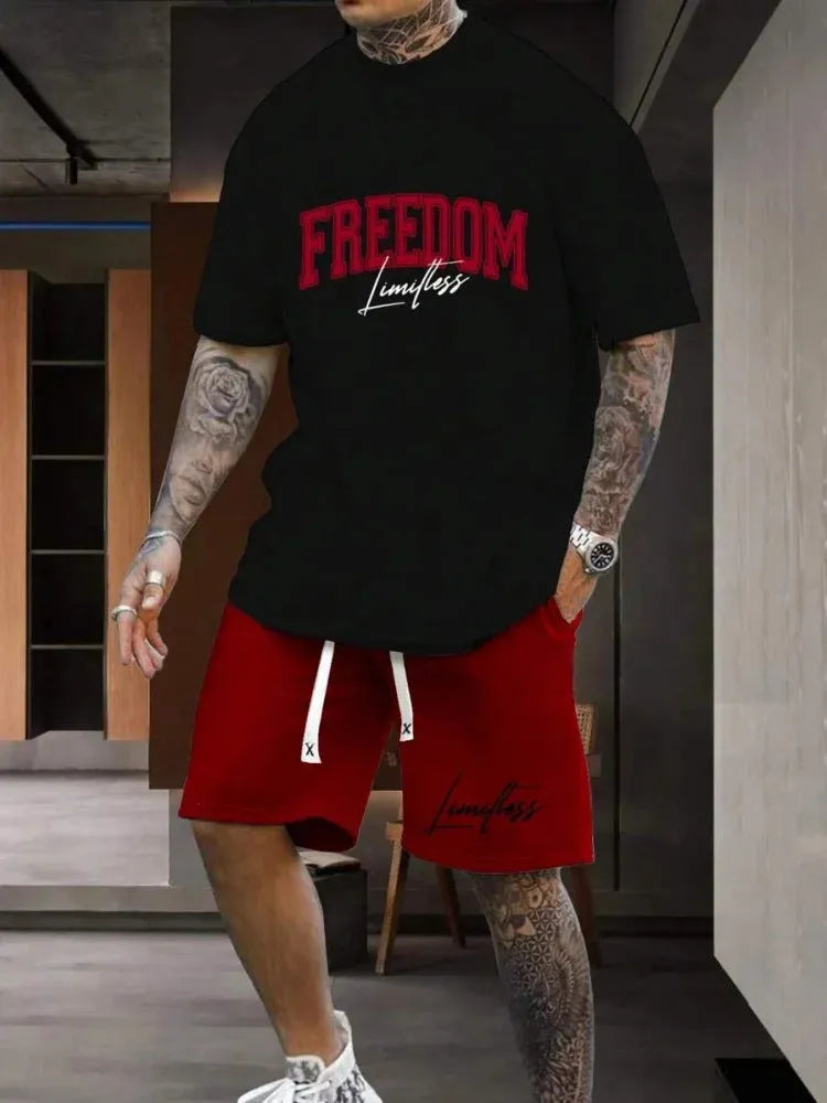Men's grey 3D printed letter short sleeve top and matching shorts sportswear set laid flat.