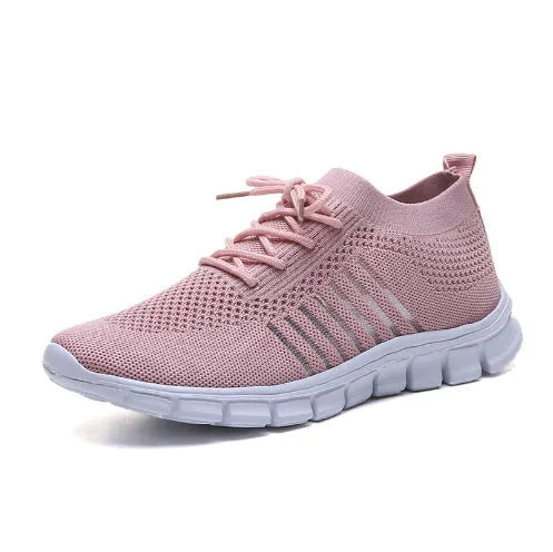 High-cut lace-up platform sneaker in a casual style with a breathable fabric upper and flat rubber sole.