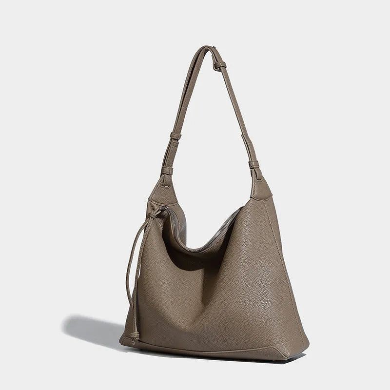 Large capacity soft PU leather messenger bag in caramel and elephant grey colours showing 36cm dimensions