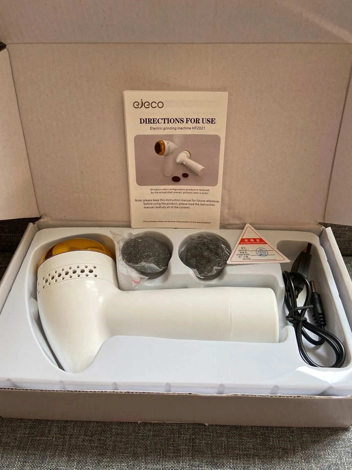 Electric foot grinder with a quartz grinding head in gold, silver, pink gold or white finish.
