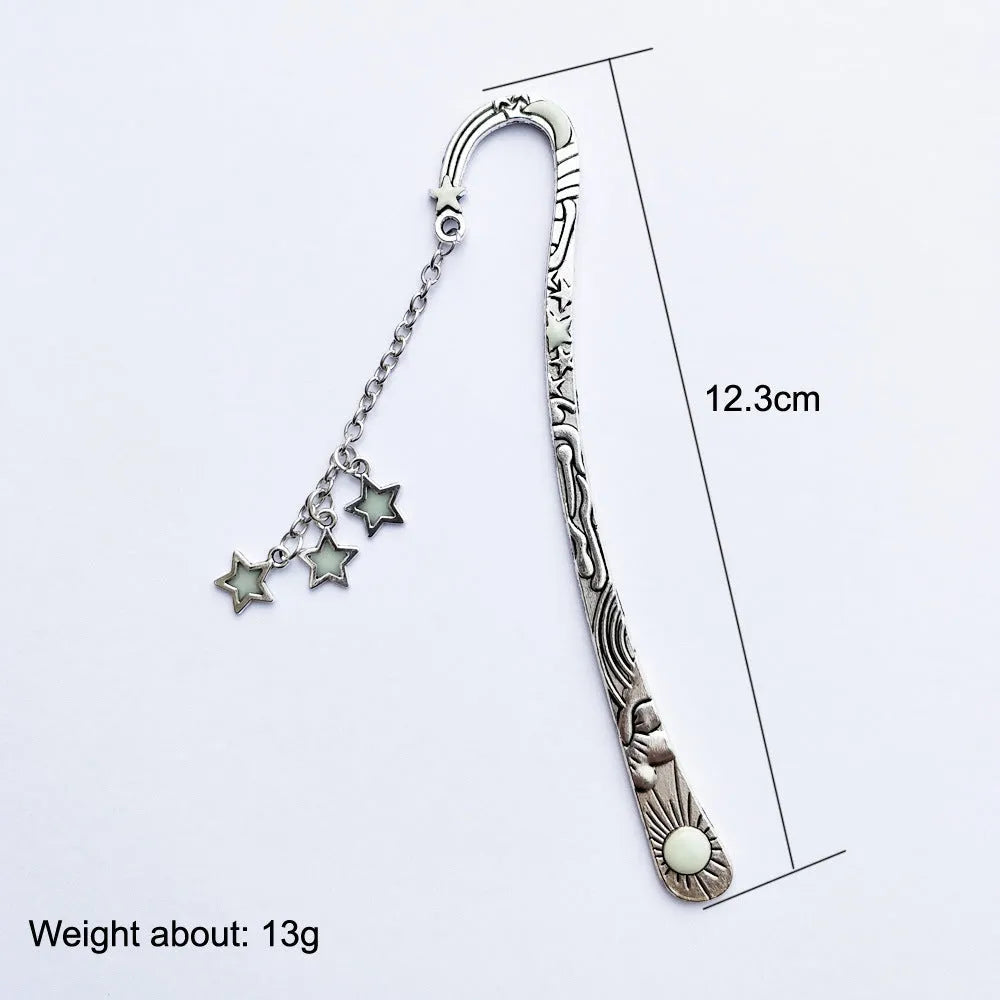 Retro five-pointed star metal bookmark with glowing elements in ancient silver finish